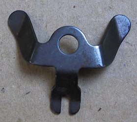 ressort de plaque carbu 104